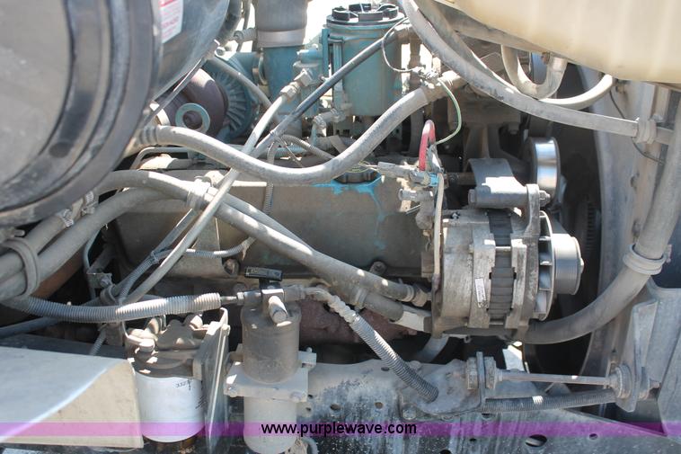 image for item I7994 1998 International 4700 low profile dump bed semi truck