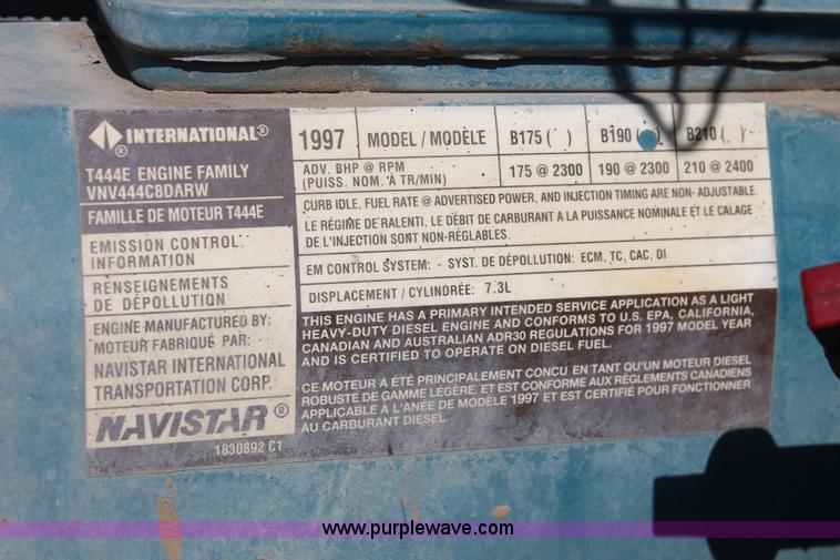 image for item I7994 1998 International 4700 low profile dump bed semi truck