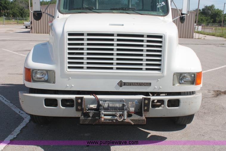 image for item I7994 1998 International 4700 low profile dump bed semi truck