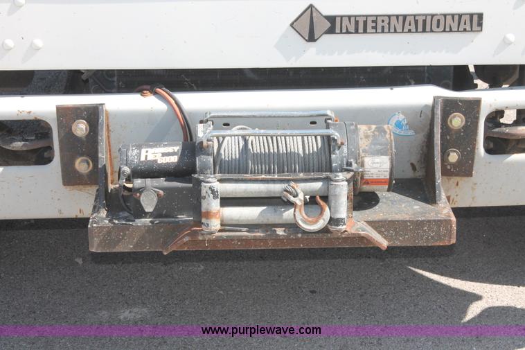 image for item I7994 1998 International 4700 low profile dump bed semi truck