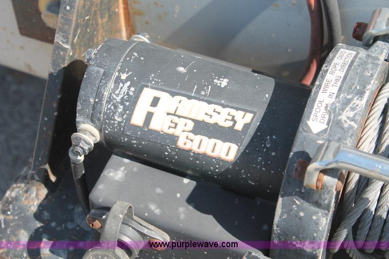 image for item I7994 1998 International 4700 low profile dump bed semi truck