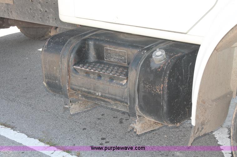 image for item I7994 1998 International 4700 low profile dump bed semi truck