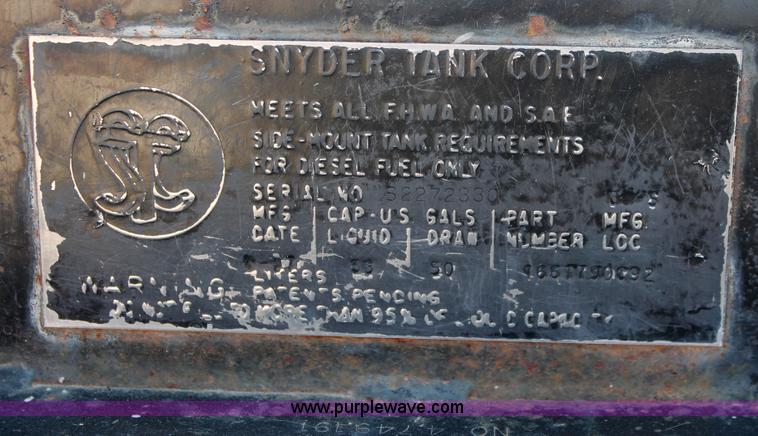 image for item I7994 1998 International 4700 low profile dump bed semi truck