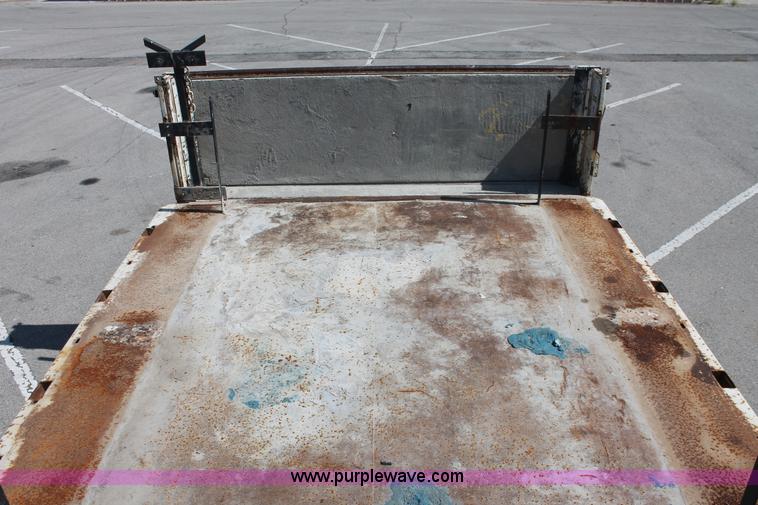 image for item I7994 1998 International 4700 low profile dump bed semi truck