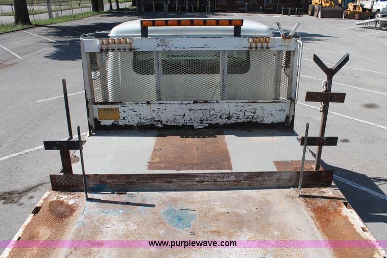 image for item I7994 1998 International 4700 low profile dump bed semi truck