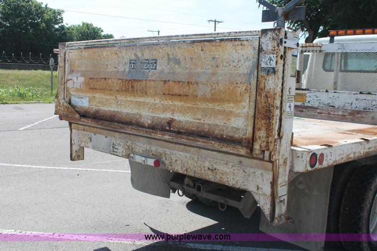 image for item I7994 1998 International 4700 low profile dump bed semi truck