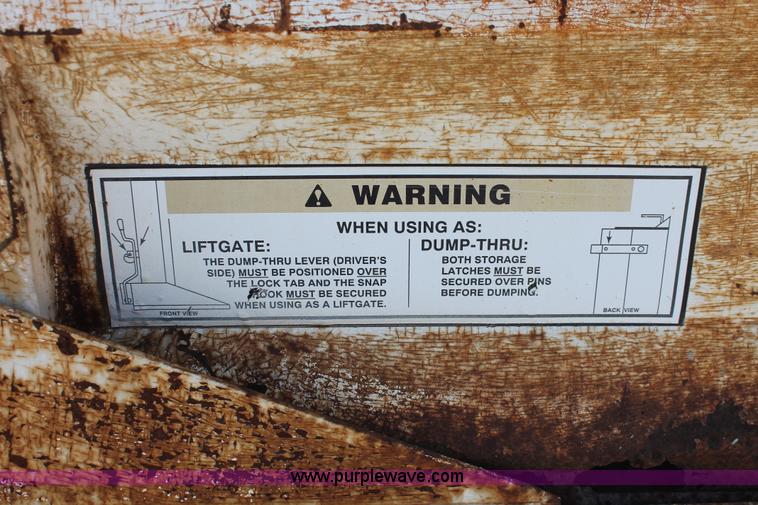 image for item I7994 1998 International 4700 low profile dump bed semi truck