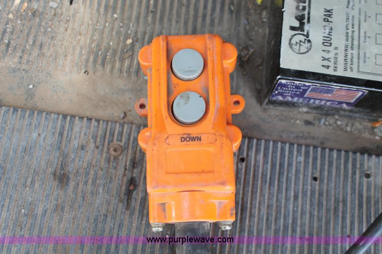 image for item I7994 1998 International 4700 low profile dump bed semi truck