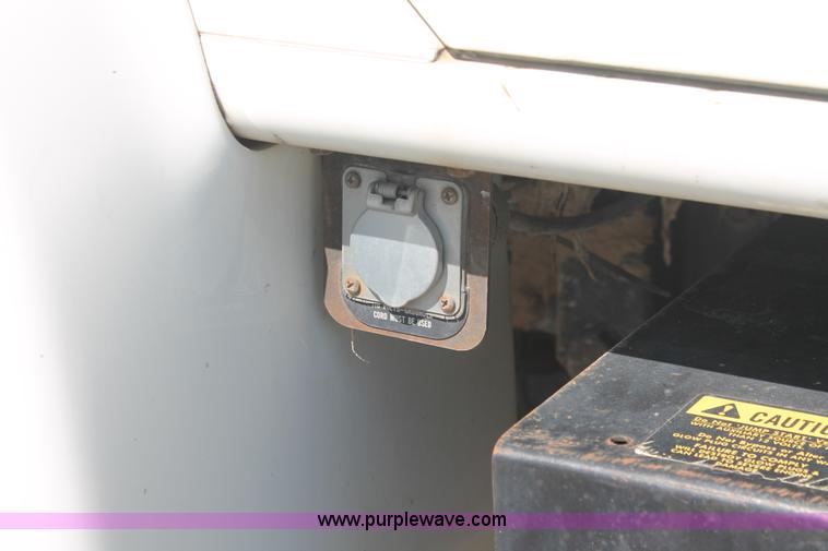 image for item I7994 1998 International 4700 low profile dump bed semi truck