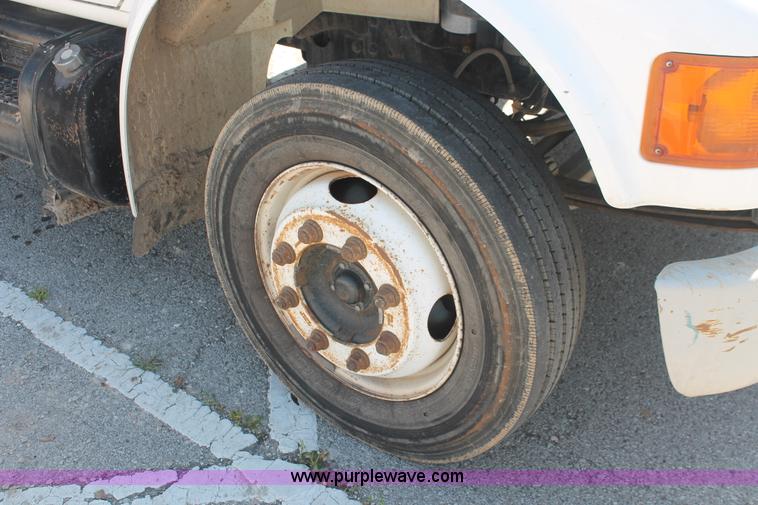 image for item I7994 1998 International 4700 low profile dump bed semi truck