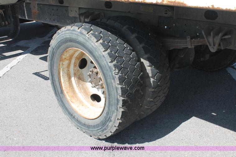 image for item I7994 1998 International 4700 low profile dump bed semi truck