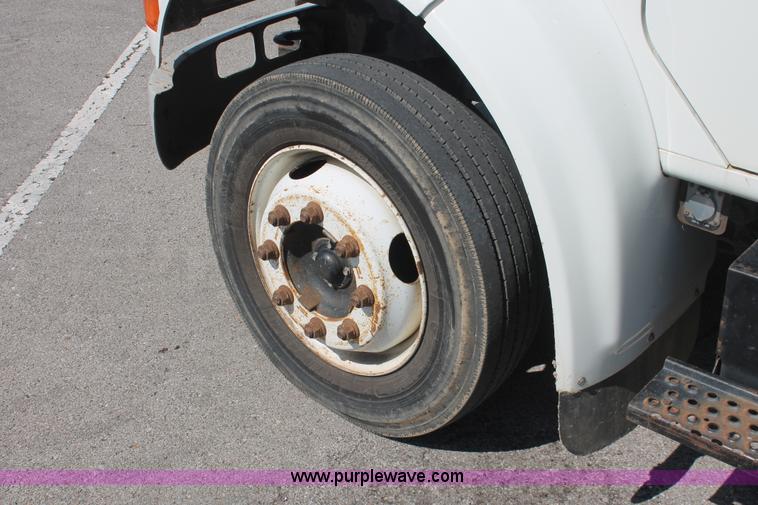 image for item I7994 1998 International 4700 low profile dump bed semi truck