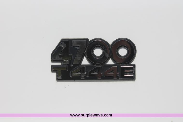 image for item I7994 1998 International 4700 low profile dump bed semi truck