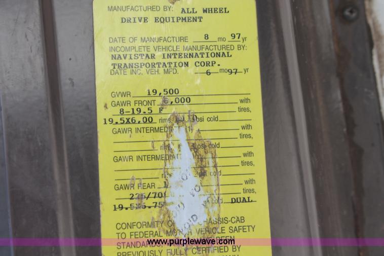 image for item I7994 1998 International 4700 low profile dump bed semi truck