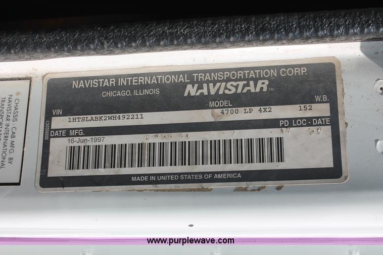 image for item I7994 1998 International 4700 low profile dump bed semi truck