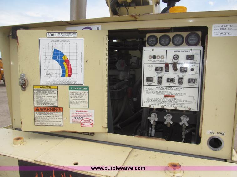 image for item B5498 1999 JLG 40H telescoping boom lift