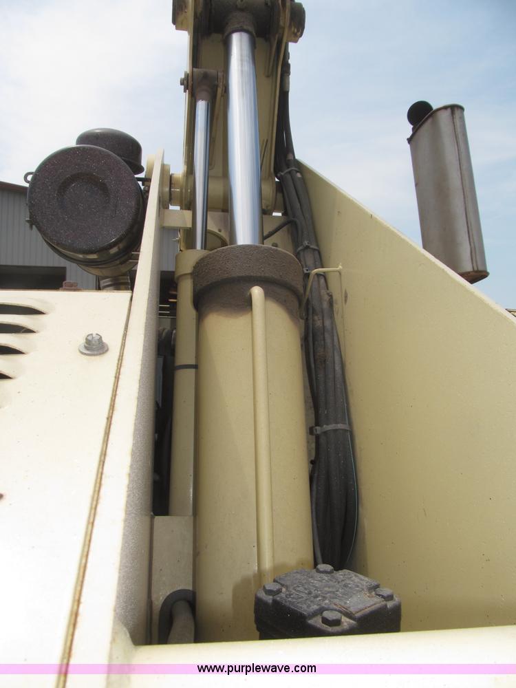 image for item B5498 1999 JLG 40H telescoping boom lift