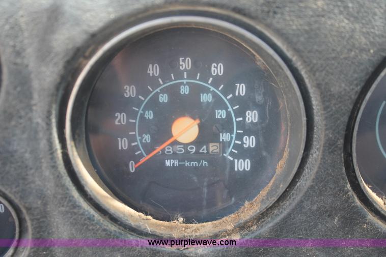 image for item H3087 1977 GMC Sierra 6500 flatbed ladder/boom truck