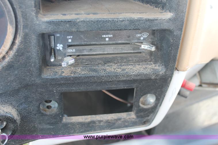 image for item H3087 1977 GMC Sierra 6500 flatbed ladder/boom truck