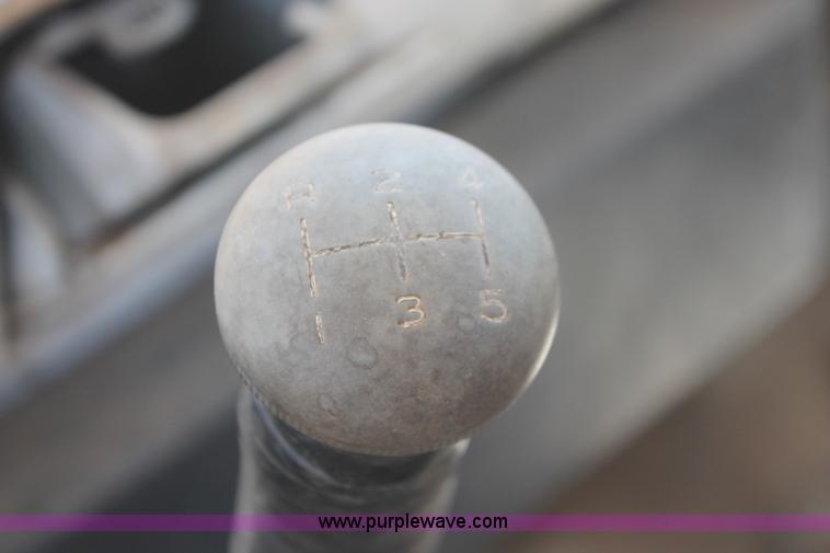 image for item H3087 1977 GMC Sierra 6500 flatbed ladder/boom truck