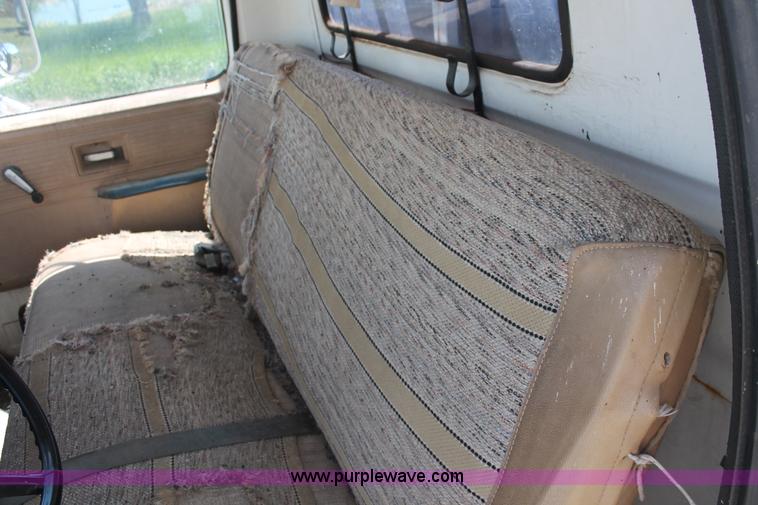 image for item H3087 1977 GMC Sierra 6500 flatbed ladder/boom truck