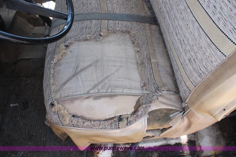 image for item H3087 1977 GMC Sierra 6500 flatbed ladder/boom truck