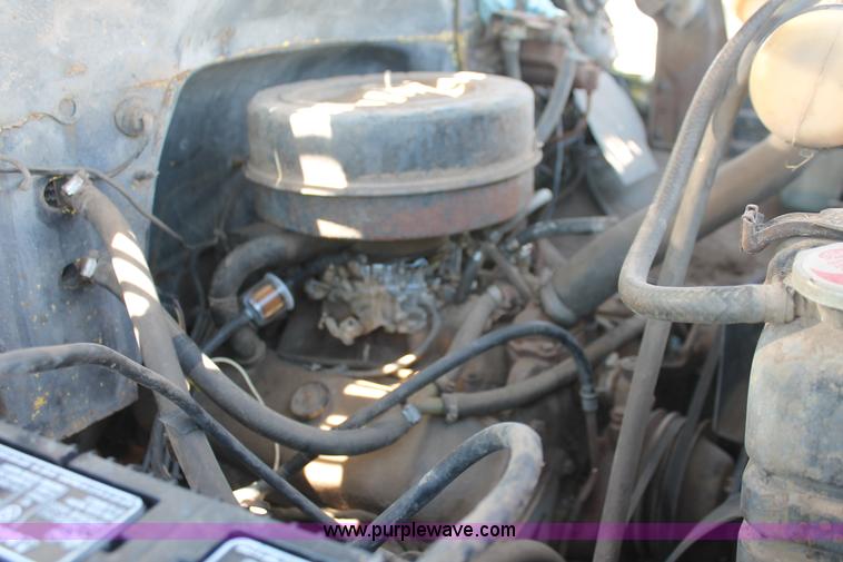 image for item H3087 1977 GMC Sierra 6500 flatbed ladder/boom truck