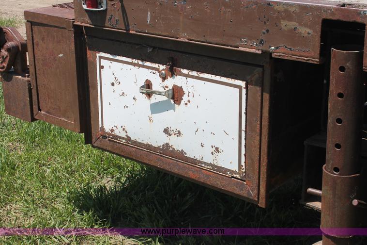 image for item H3087 1977 GMC Sierra 6500 flatbed ladder/boom truck