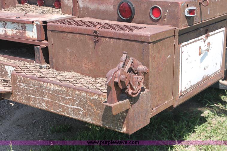 image for item H3087 1977 GMC Sierra 6500 flatbed ladder/boom truck