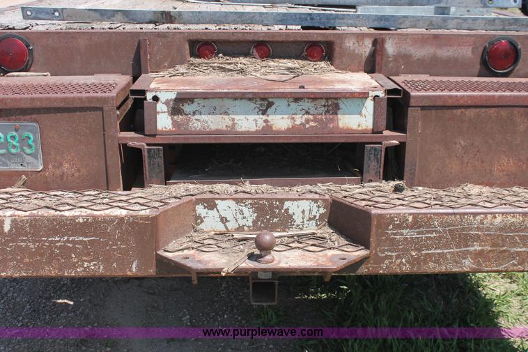 image for item H3087 1977 GMC Sierra 6500 flatbed ladder/boom truck