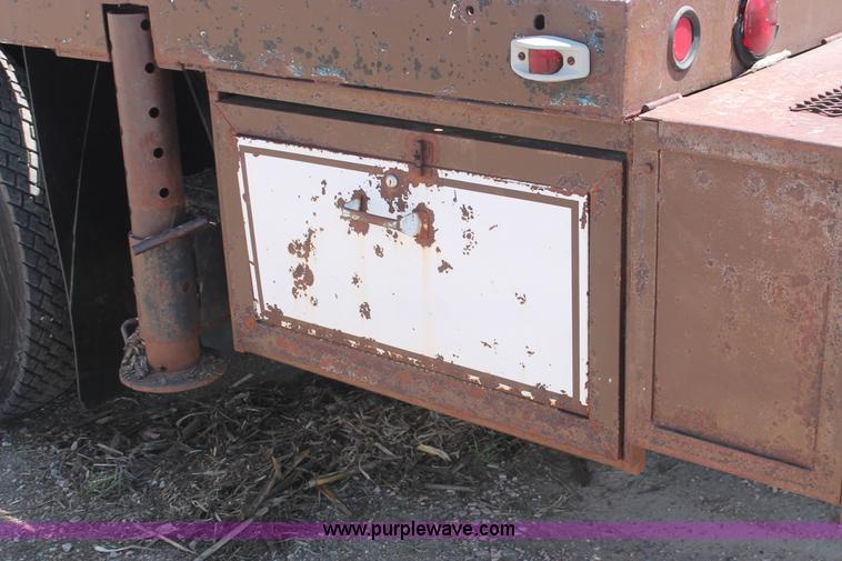 image for item H3087 1977 GMC Sierra 6500 flatbed ladder/boom truck