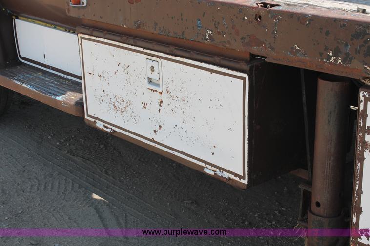 image for item H3087 1977 GMC Sierra 6500 flatbed ladder/boom truck