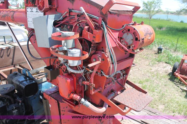 image for item H3087 1977 GMC Sierra 6500 flatbed ladder/boom truck