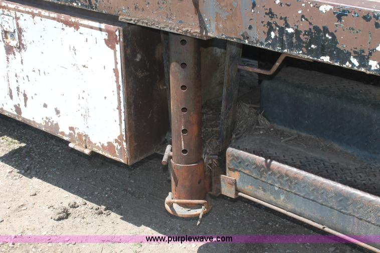 image for item H3087 1977 GMC Sierra 6500 flatbed ladder/boom truck