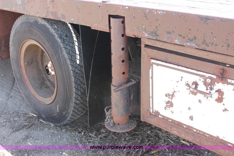 image for item H3087 1977 GMC Sierra 6500 flatbed ladder/boom truck