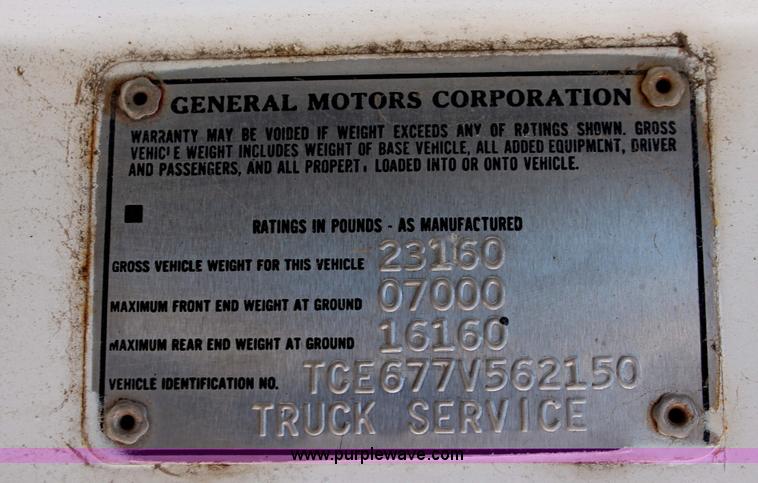 image for item H3087 1977 GMC Sierra 6500 flatbed ladder/boom truck