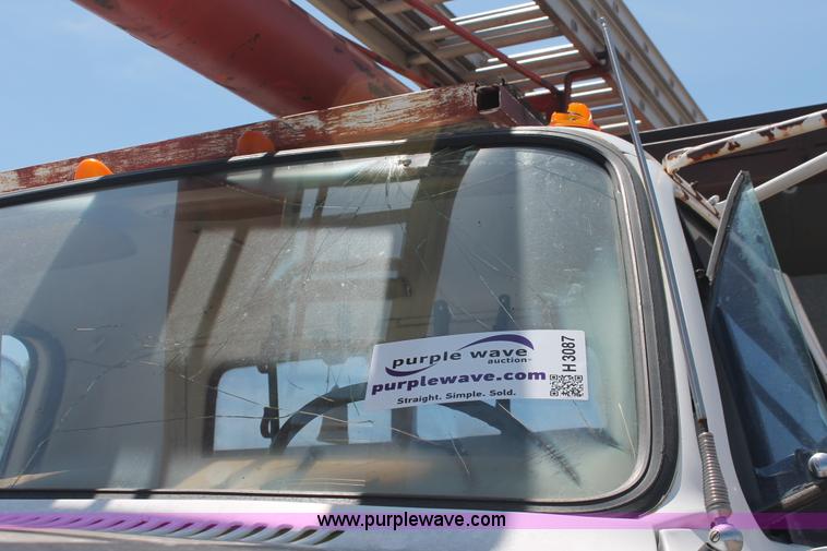 image for item H3087 1977 GMC Sierra 6500 flatbed ladder/boom truck