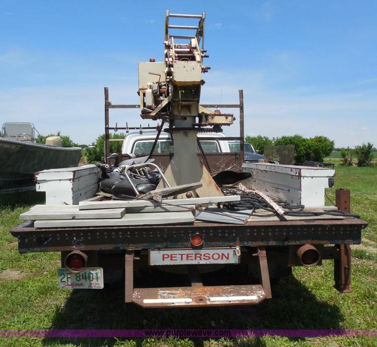 image for item H3091 1972 Ford F250 flatbed ladder/boom truck