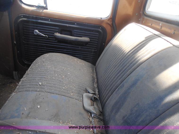 image for item H3091 1972 Ford F250 flatbed ladder/boom truck