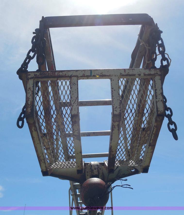 image for item H3091 1972 Ford F250 flatbed ladder/boom truck