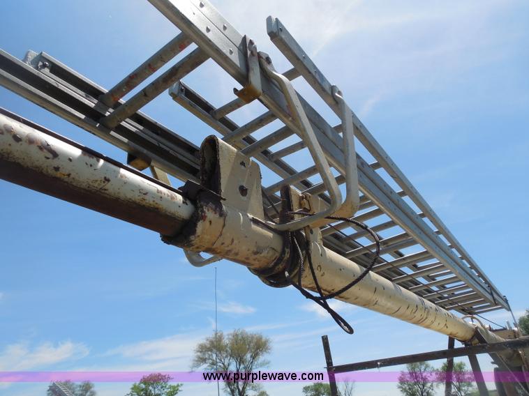 image for item H3091 1972 Ford F250 flatbed ladder/boom truck