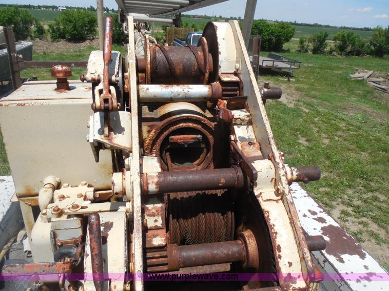 image for item H3091 1972 Ford F250 flatbed ladder/boom truck