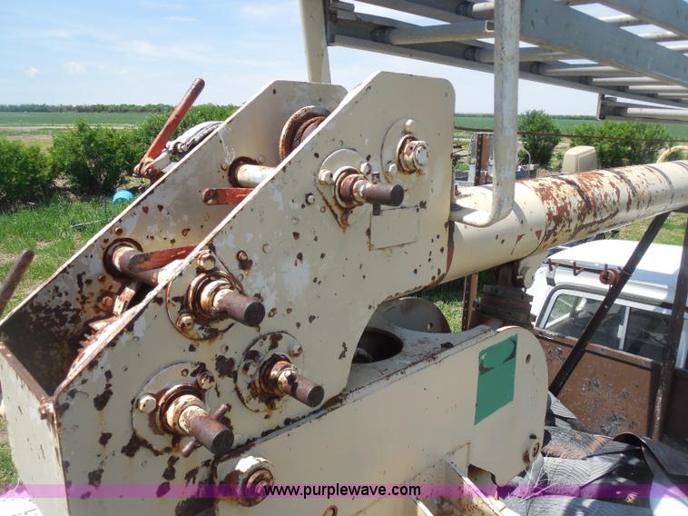 image for item H3091 1972 Ford F250 flatbed ladder/boom truck