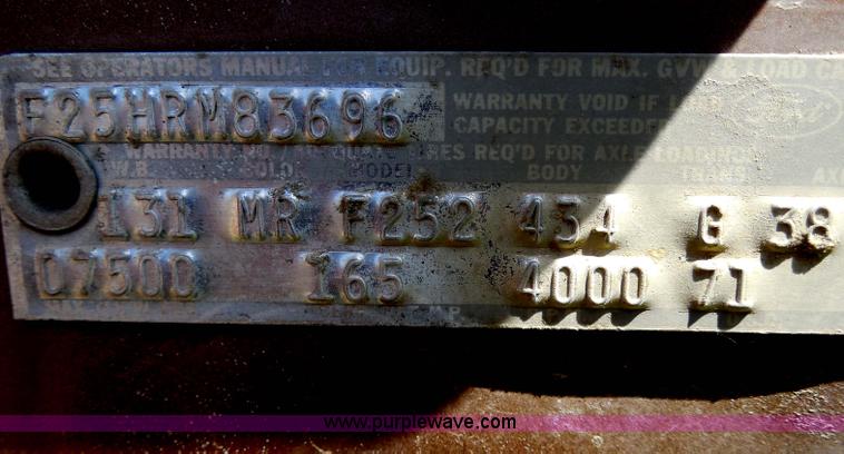 image for item H3091 1972 Ford F250 flatbed ladder/boom truck