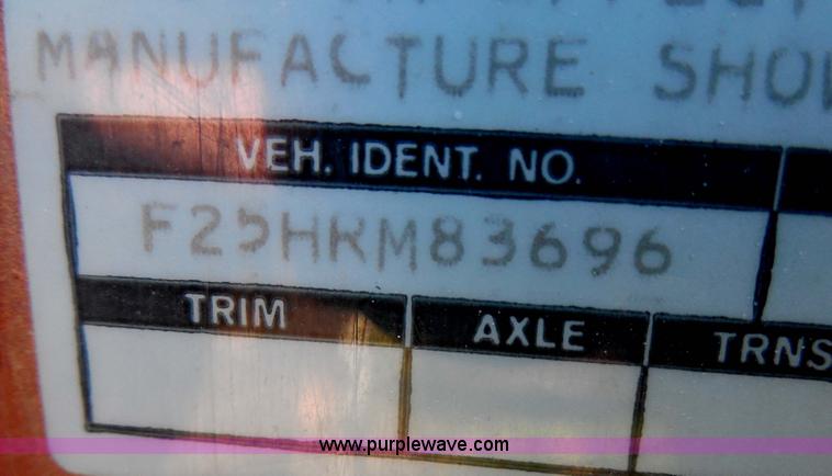 image for item H3091 1972 Ford F250 flatbed ladder/boom truck