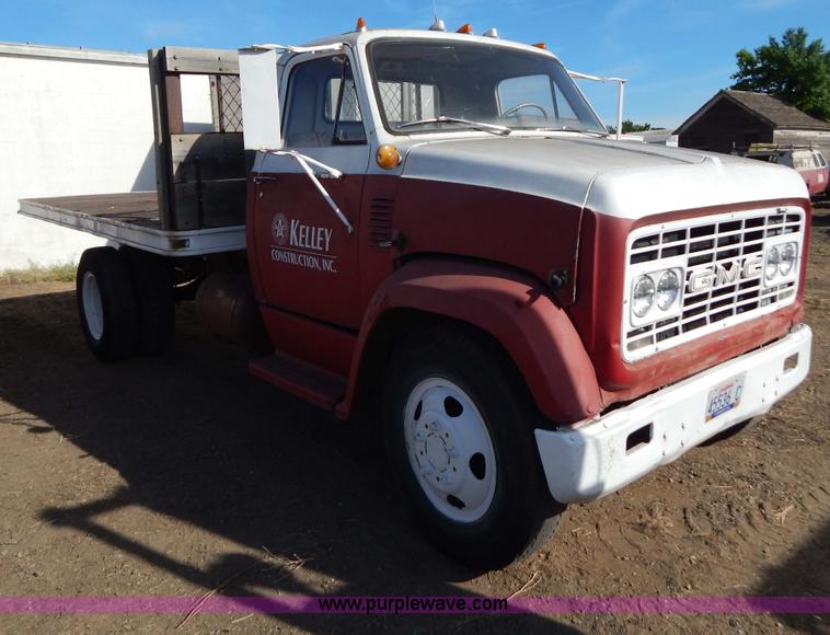 image for item I4495 1967 GMC flatbed dump truck