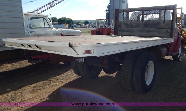 image for item I4495 1967 GMC flatbed dump truck