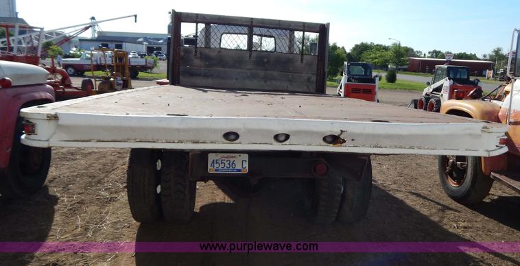 image for item I4495 1967 GMC flatbed dump truck