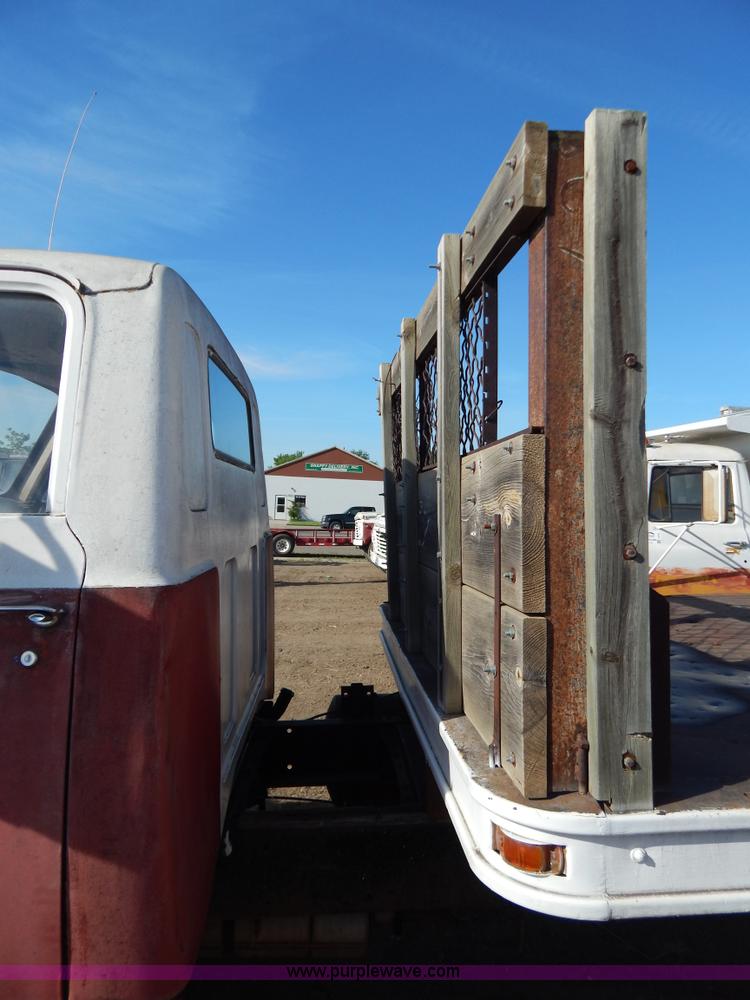 image for item I4495 1967 GMC flatbed dump truck