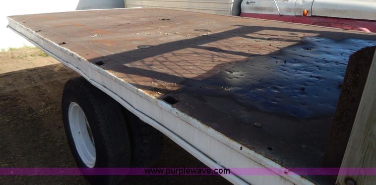 image for item I4495 1967 GMC flatbed dump truck